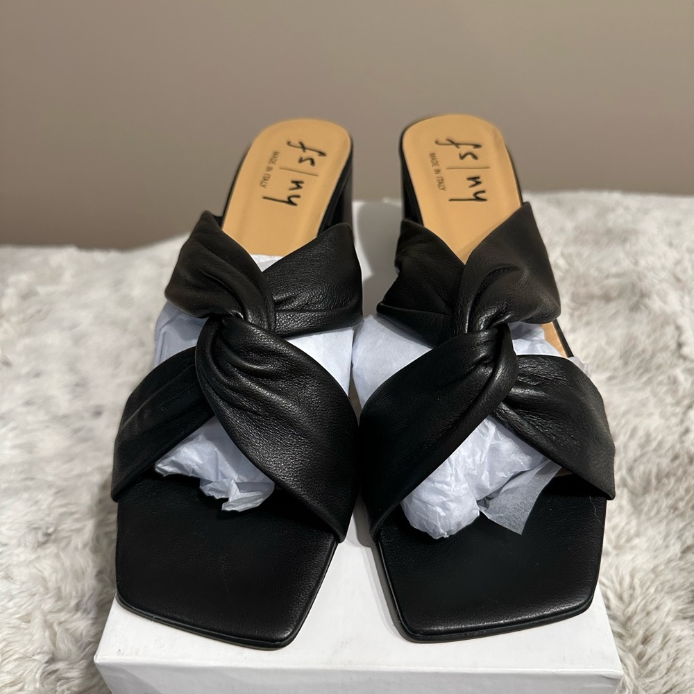 French Sole New York Black Napa Leather Mules with Twist Design